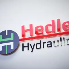 Hedley Hydraulics logo with red "Hedley" and silver "Hydraulics" text, and a circular emblem. This company is an empire in fluid power.