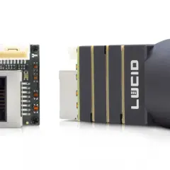 Two components from Lucid Vision Labs: a compact camera module with an RJ45 connector and a lens assembly.