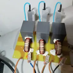Three inductors mounted on a circuit board, part of a DIY VFD filters setup.