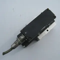 A Numatics Inc. pneumatic actuator with a cable connector.