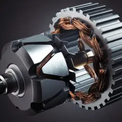 Close-up of an electric motor's stator, showcasing its copper windings and metal core. This is what is a stator: the stationary part of an electric motor.