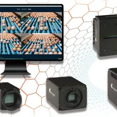 Emergent Vision Technologies' cameras and monitor display rows of eggs, showcasing their gige vision standard for quality inspection.