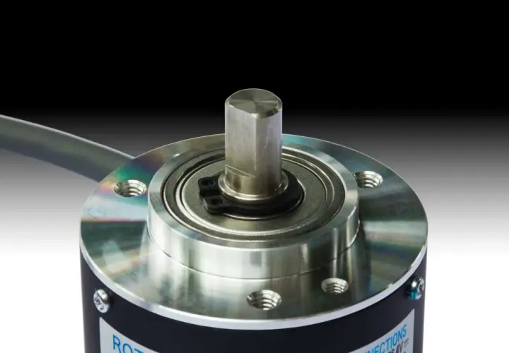 Close-up of a rotary encoder, a key component from an encoder products company, showcasing its precision shaft and bearing assembly.