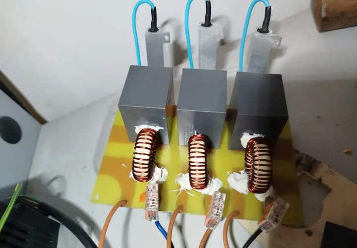 Three inductors mounted on a circuit board, part of a DIY VFD filters setup.