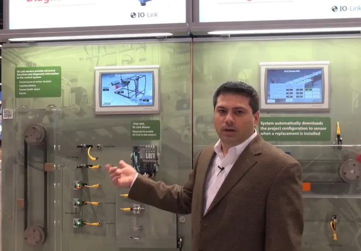 Man explains IO-Link Master with Ethernet/IP, showcasing sensor data and automatic configuration for industrial automation.