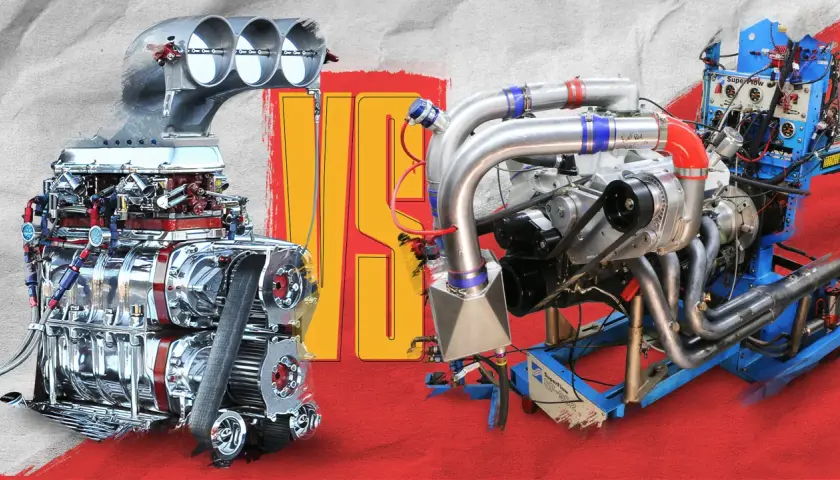 Two powerful, heavy duty motor engines, one supercharged and gleaming, the other turbocharged and complex, stand ready for action.