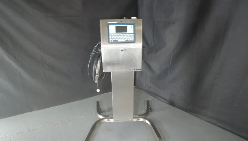A Videojet Technologies Inc. industrial printer on a wheeled stand, ready for production.