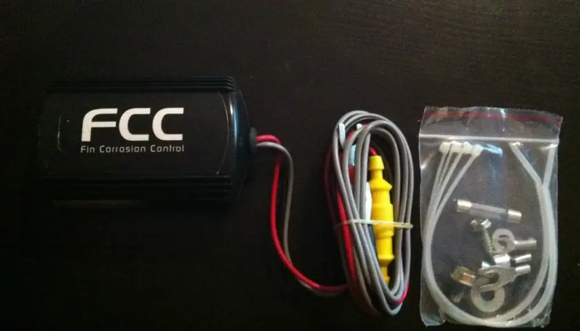 FCC Fin Corrosion Control unit with wiring and hardware. Special enclosures are required to protect motor controllers from corrosion.