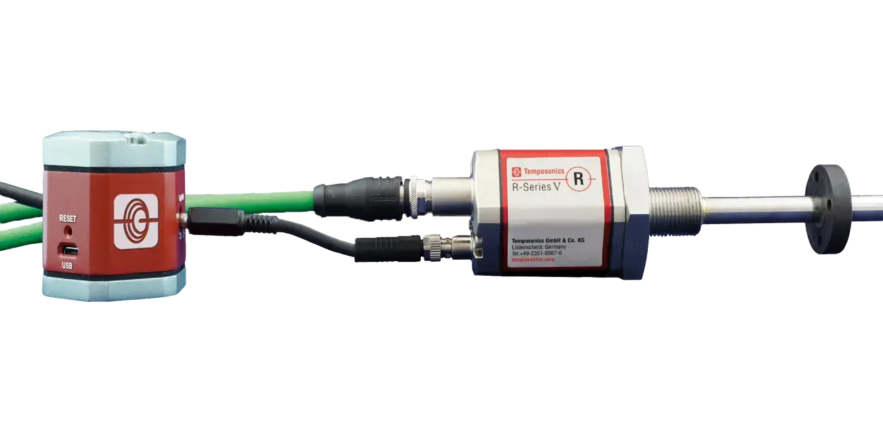 Temposonics R-Series V sensors, with a red and silver housing, connected via USB and other cables.