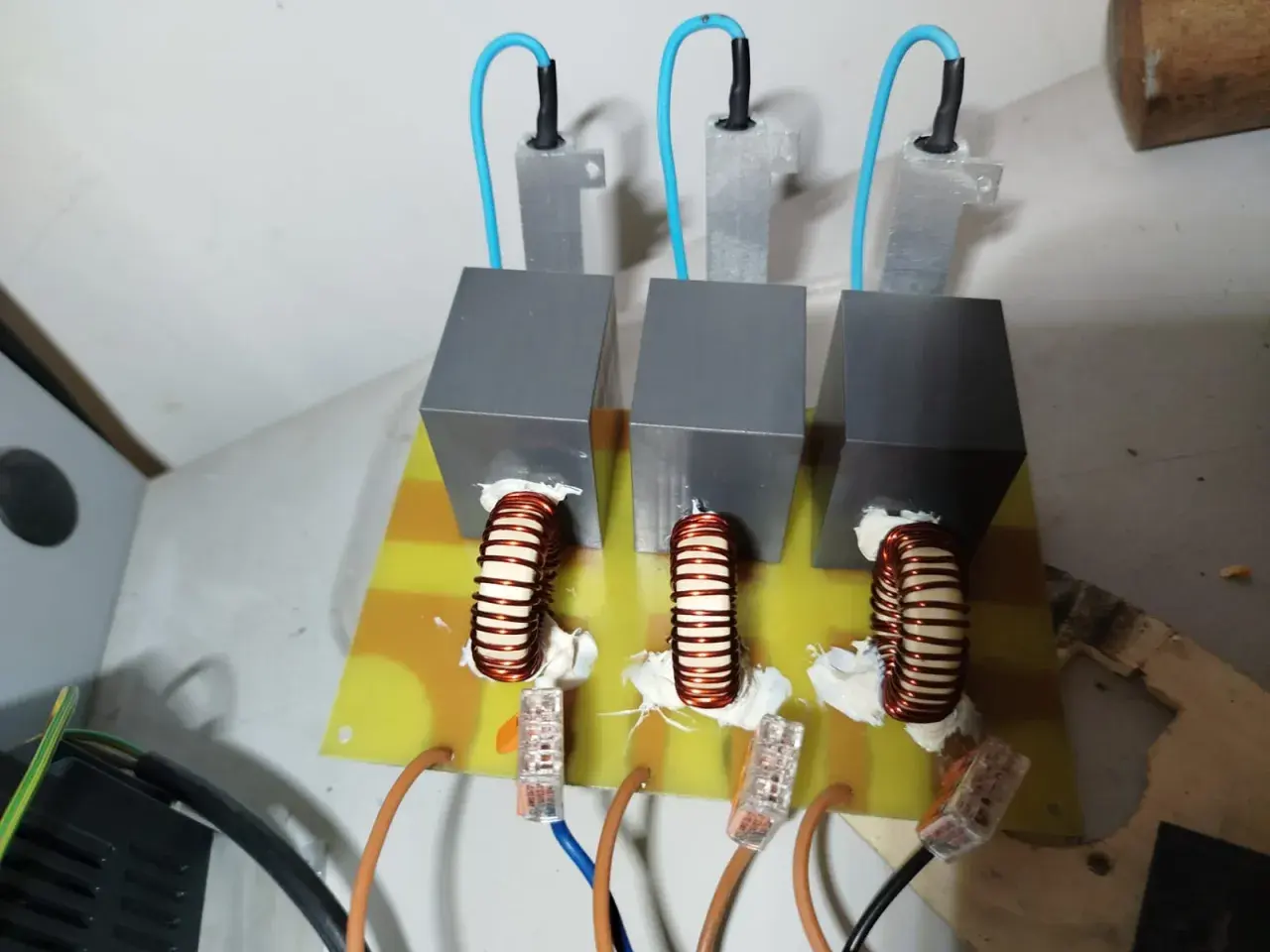 Three inductors mounted on a circuit board, part of a DIY VFD filters setup.