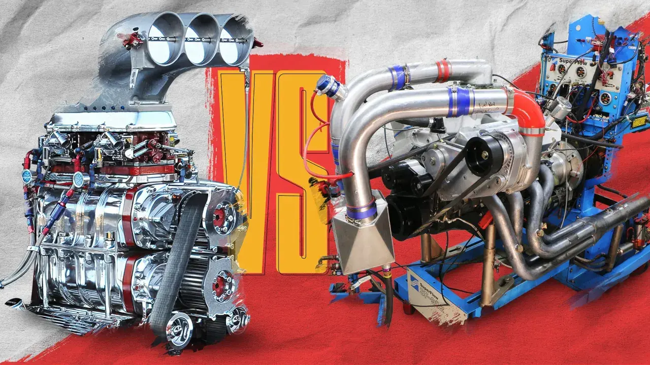 Two powerful, heavy duty motor engines, one supercharged and gleaming, the other turbocharged and complex, stand ready for action.