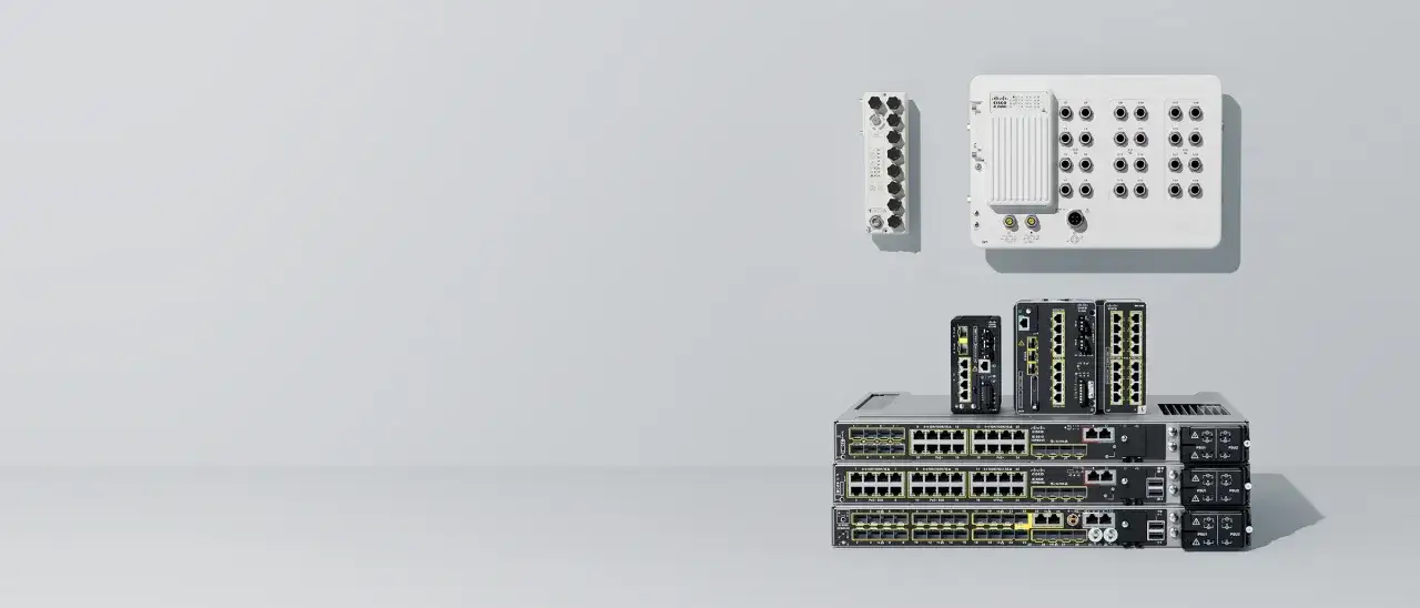 Network devices including a Cisco IE 3000 8TC, stacked switches, and wall-mounted units.