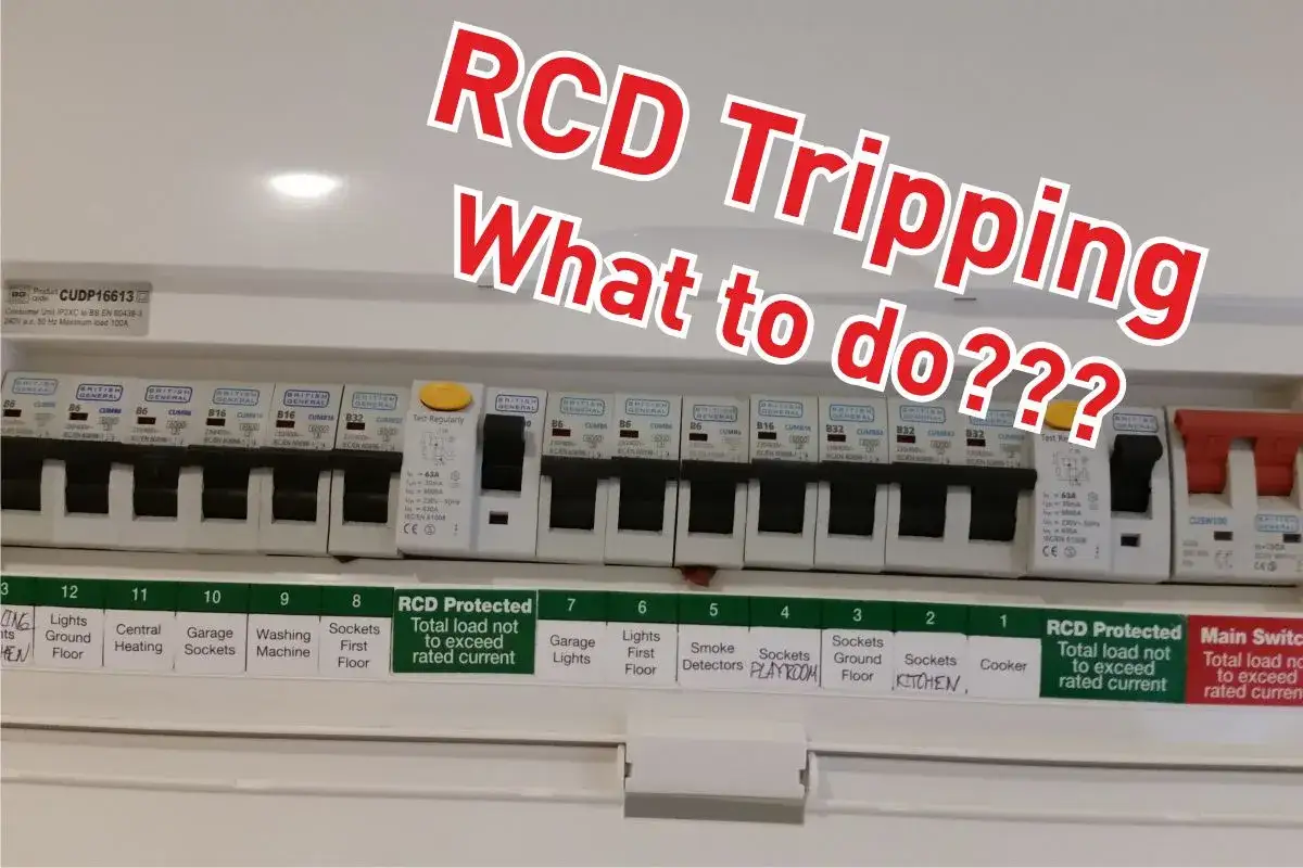 A consumer unit with multiple circuit breakers. One RCD is tripped, indicating a potential issue like a circuit breaker fuse blown.
